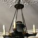 Bronze Empire-style chandelier with 4 lights