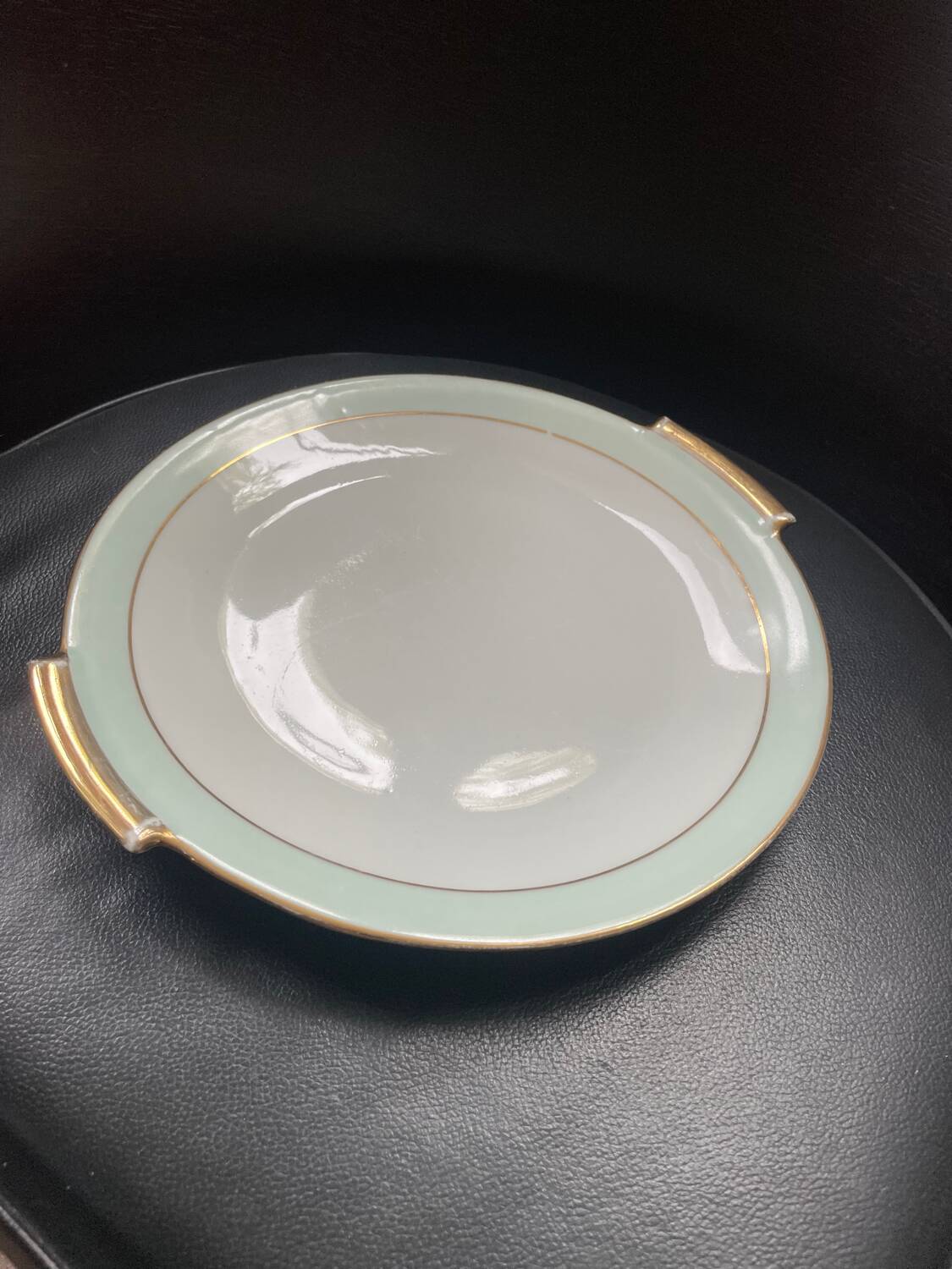 Round dish in pn france art deco ceciladon porcelain
