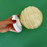 Vintage Art Deco globe wall light in pale yellow opaline.