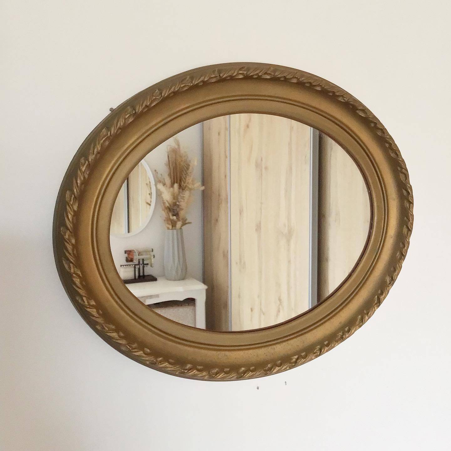 Vintage oval gold mirror
