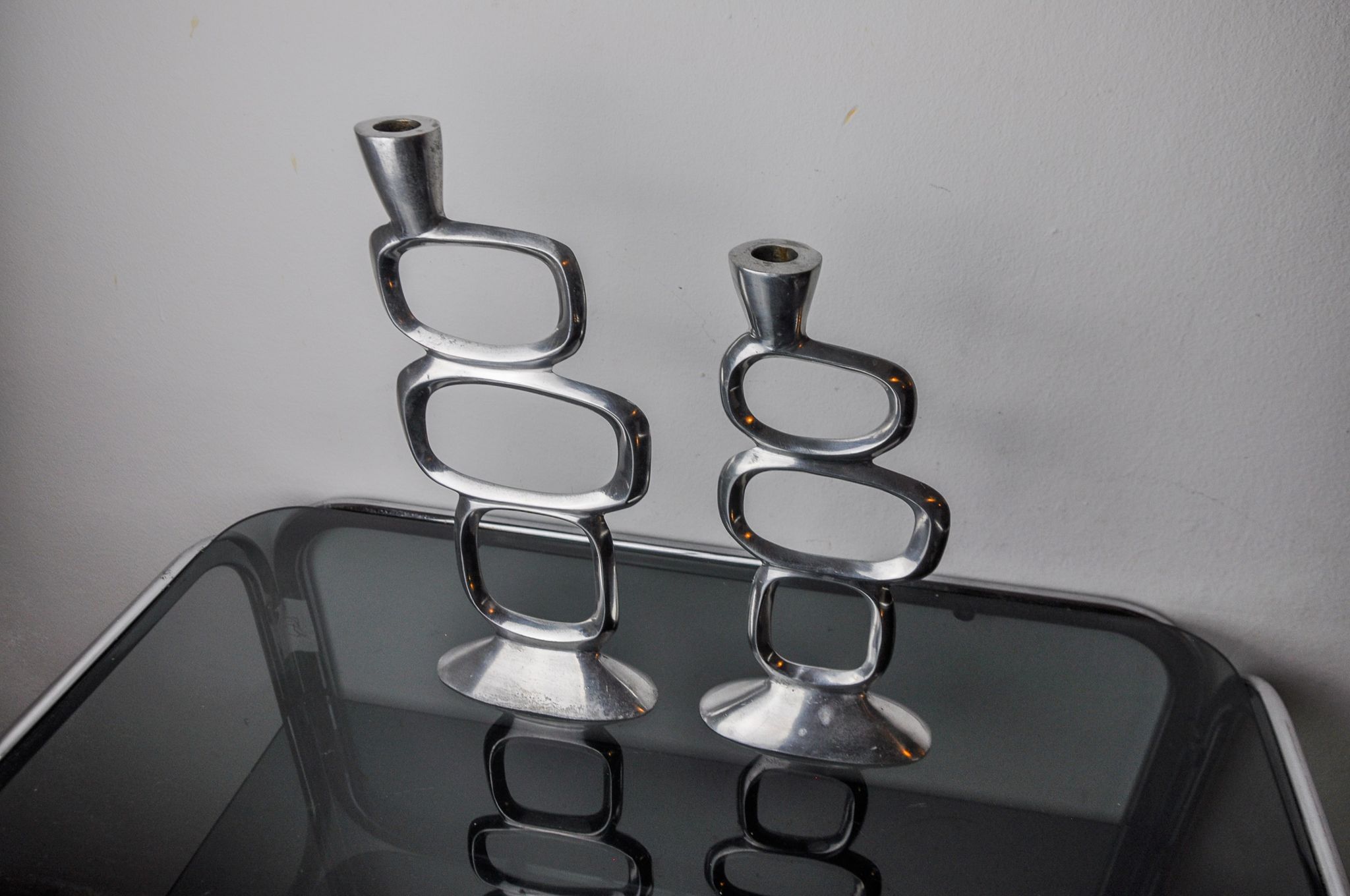 Pair of circle candlesticks by Matthew Hilton, England, 1980