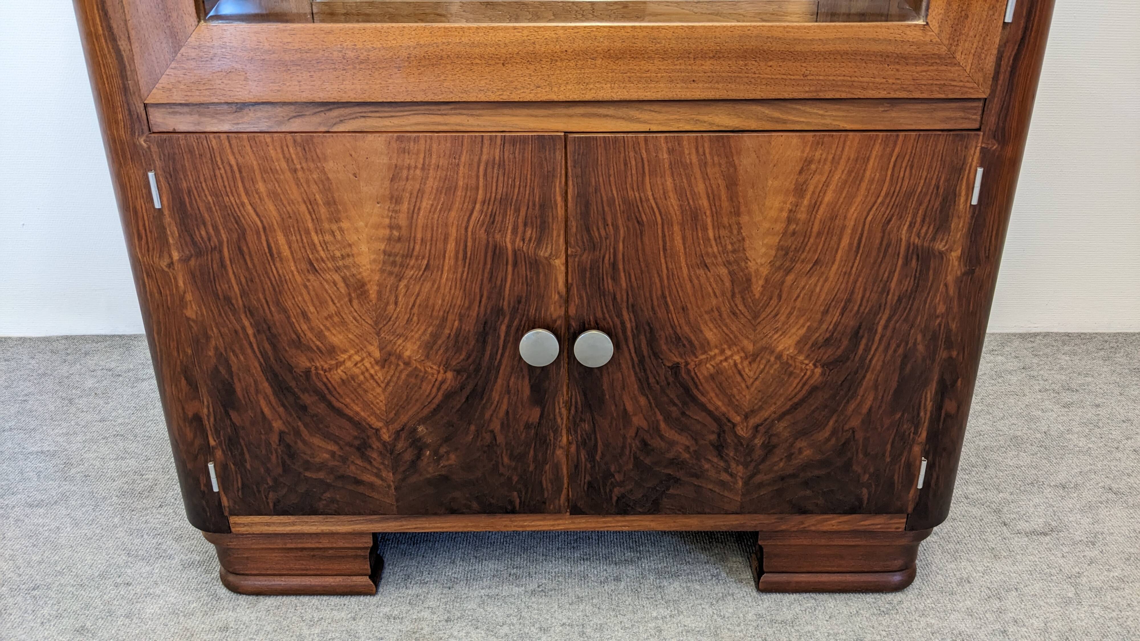Art Deco walnut burl display cabinet, France circa 1930.