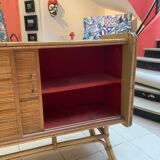 Rattan sideboard with ceramics