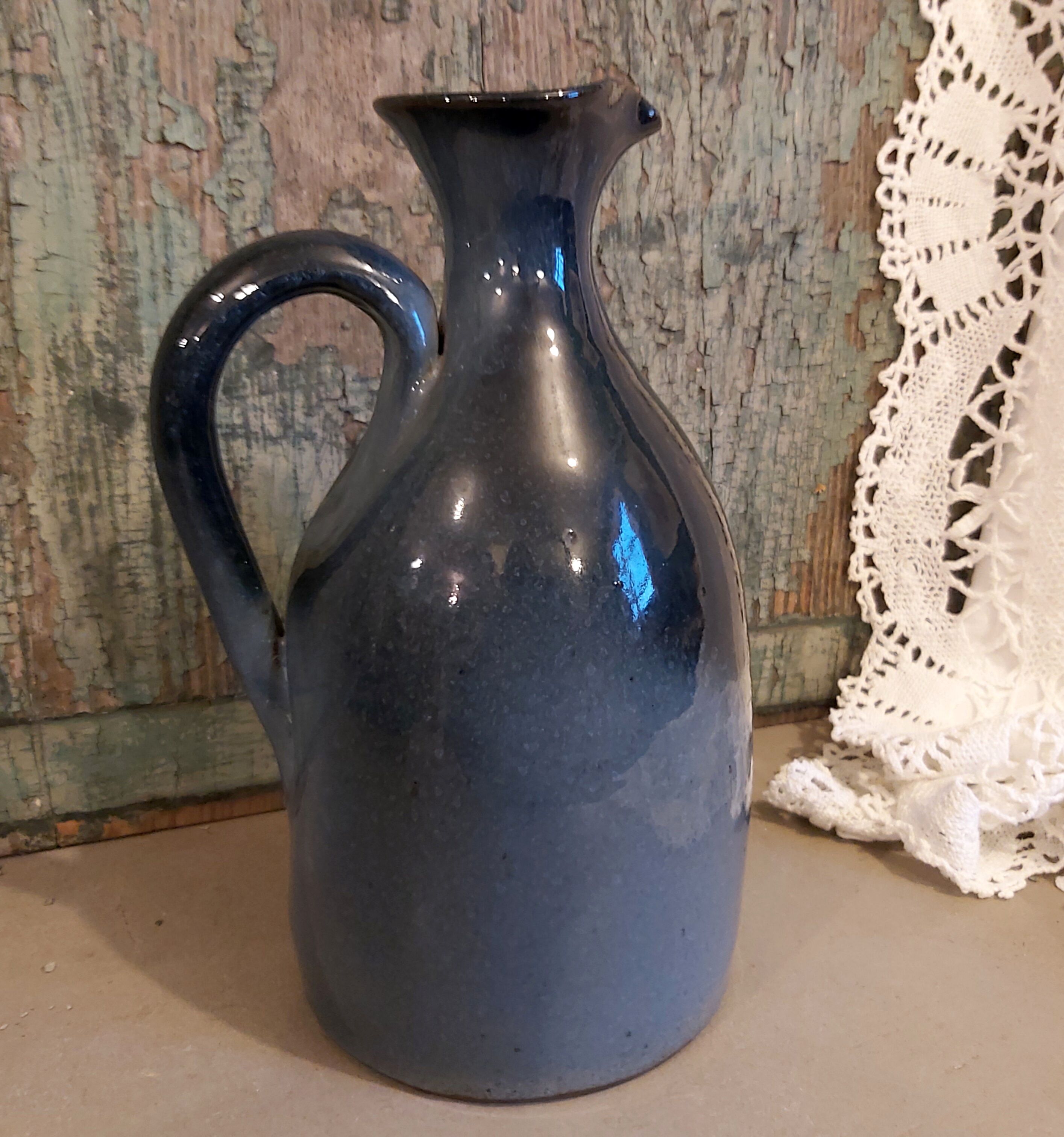 Vintage French clay carafe, glazed in different blues