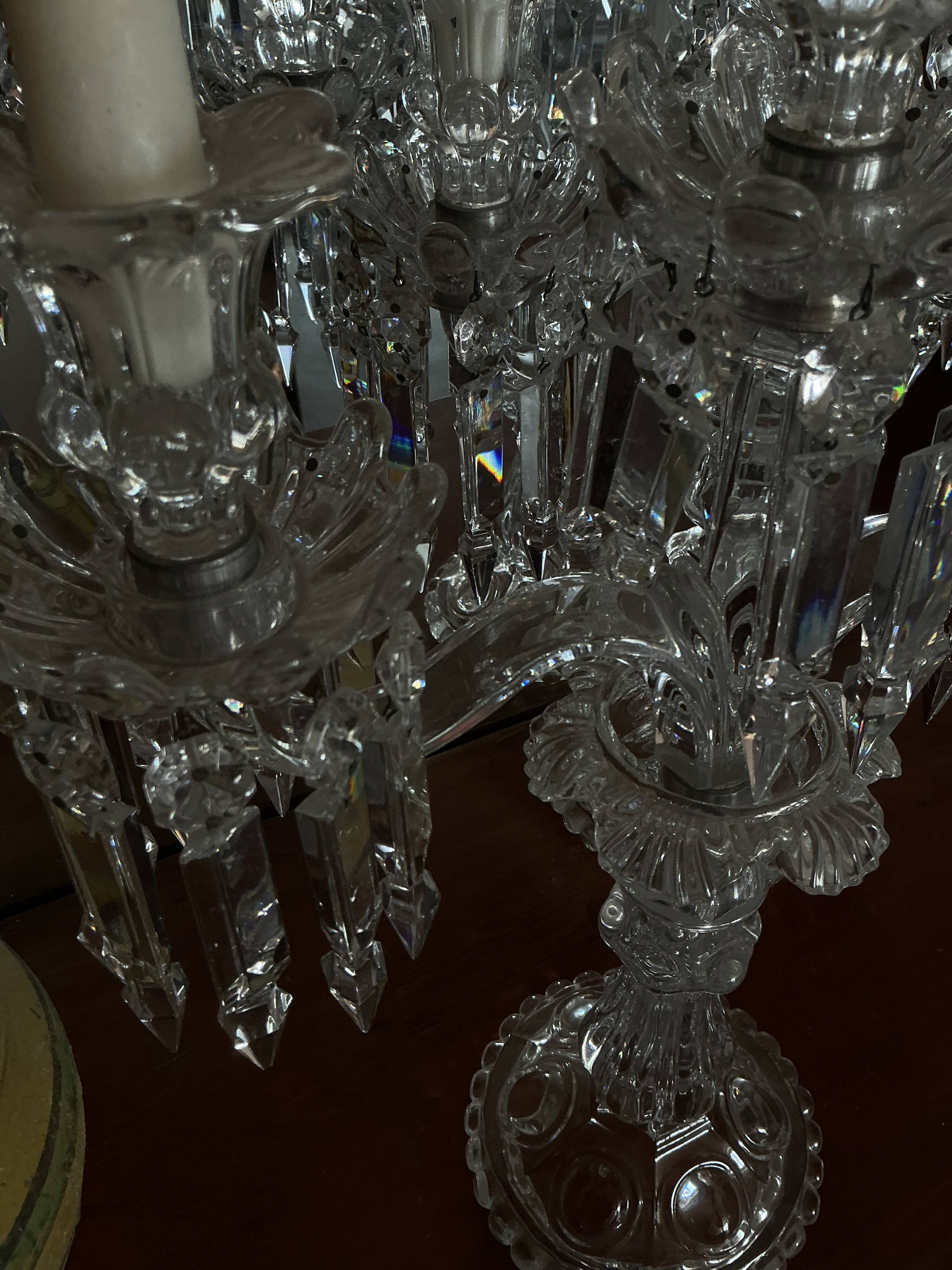 Pair of Baccarat three-light crystal chandeliers