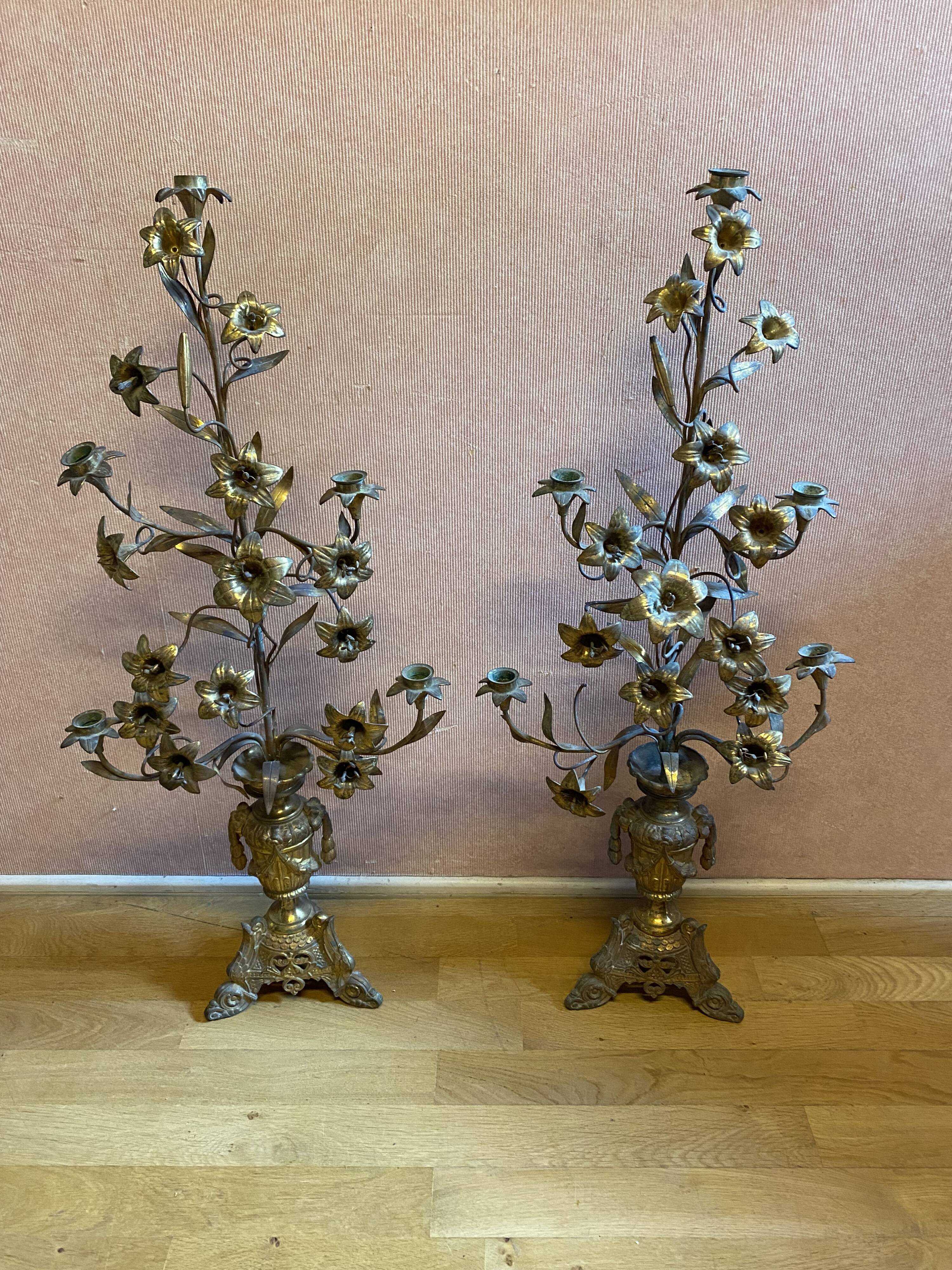 Pair of gilded bronze church candelabras.