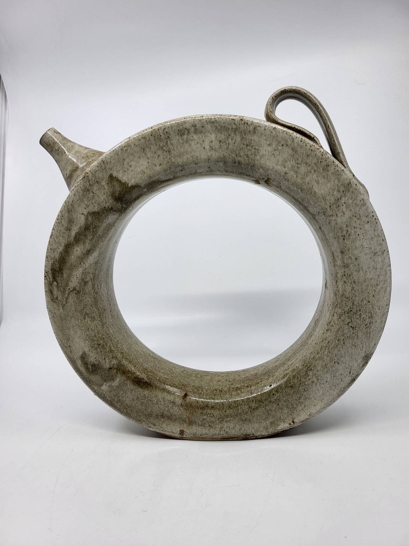 Vintage glazed stoneware pitcher in sculptural ring shape (1970s)