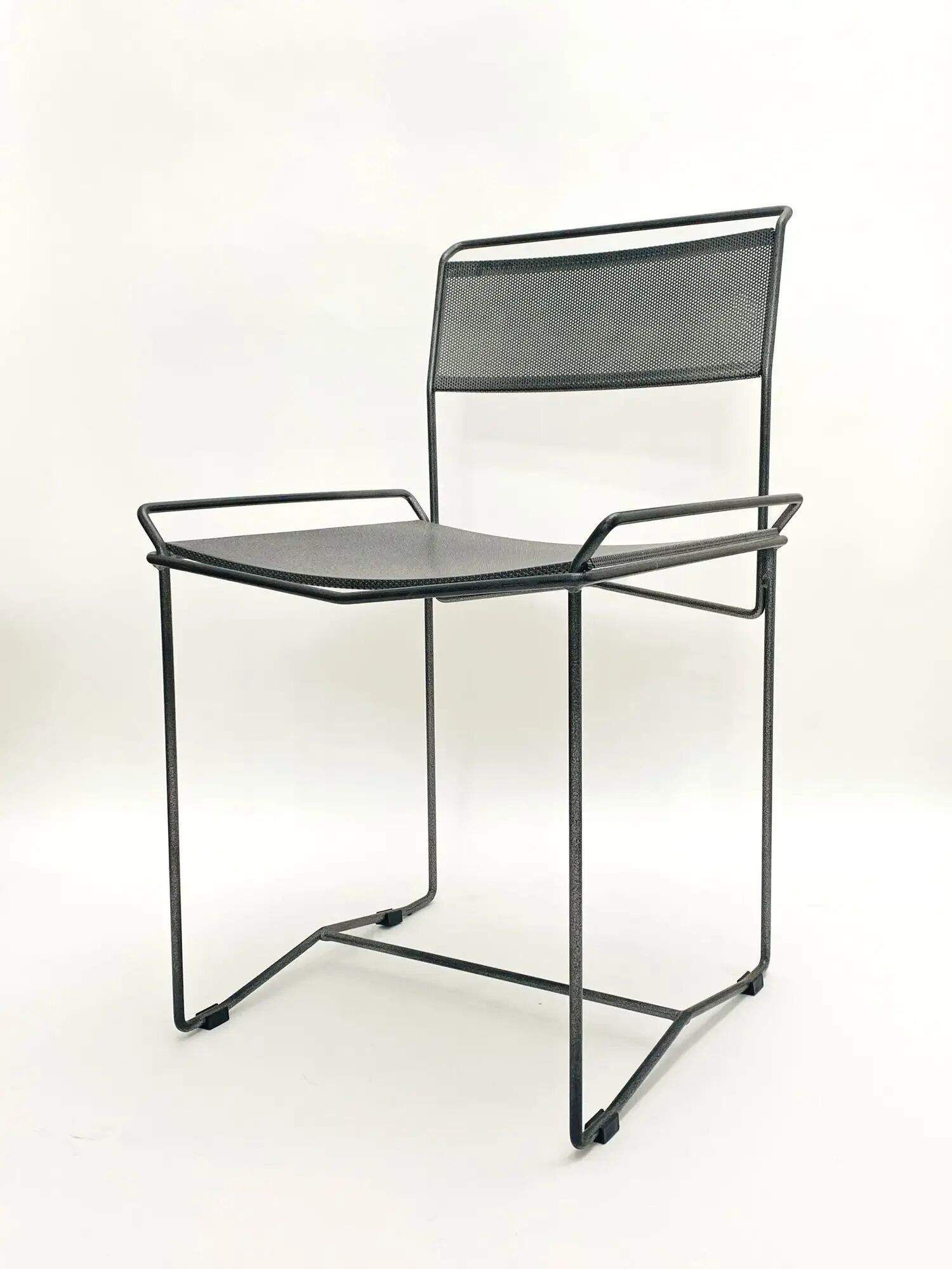 Perforated steel chairs