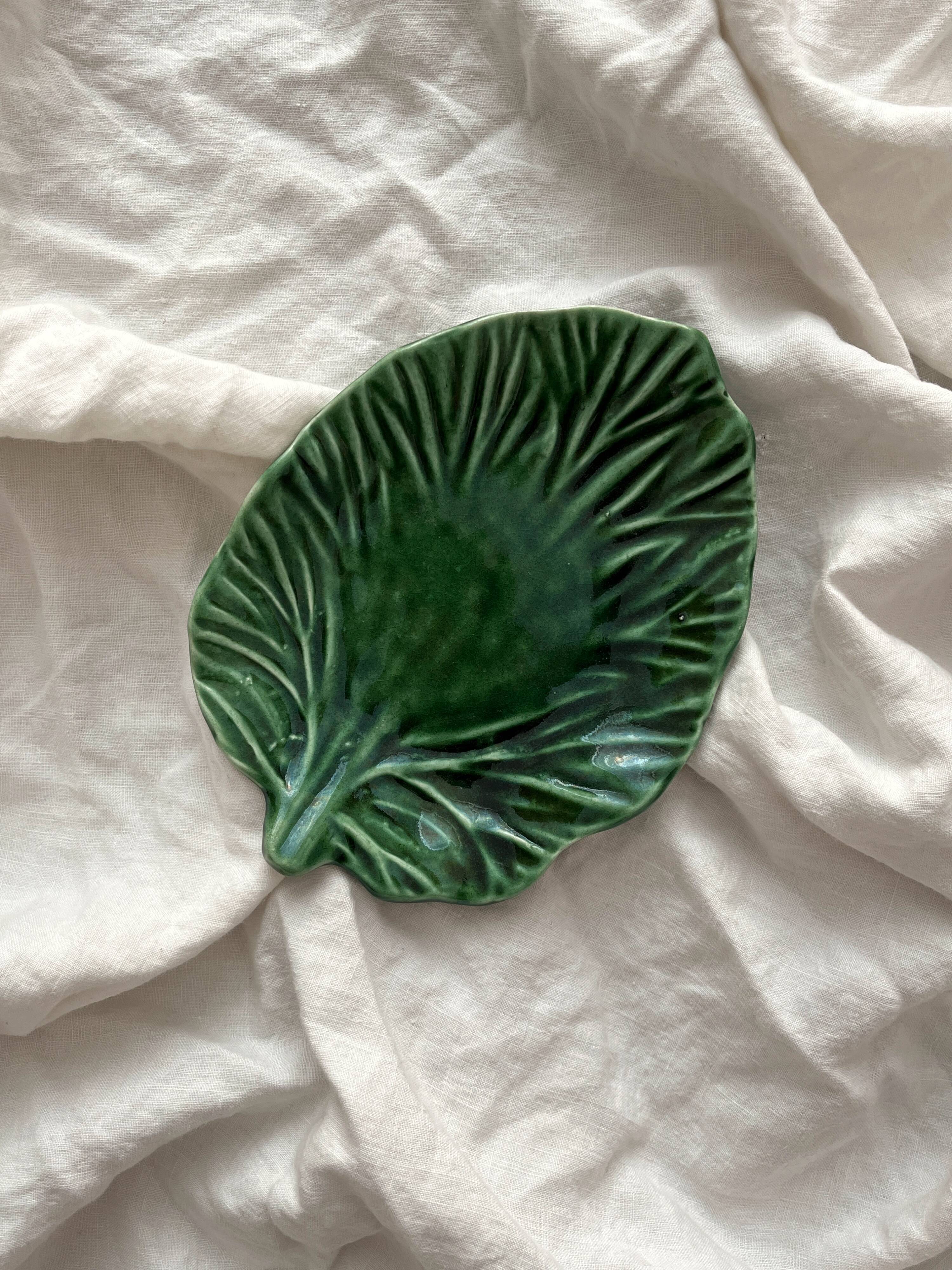 Small empty pocket dish in vintage slip leaf