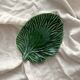 Small empty pocket dish in vintage slip leaf