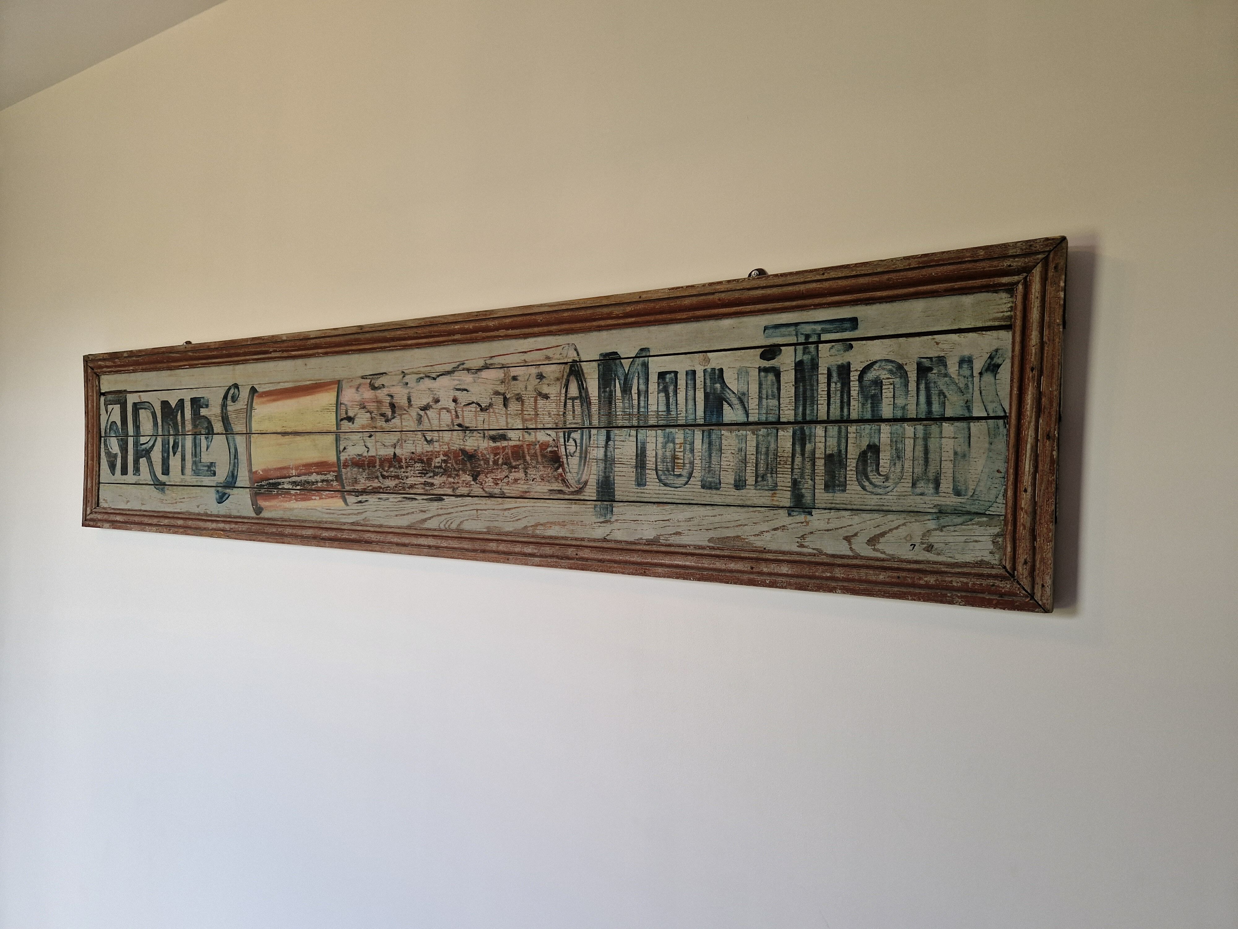 Ancienne enseigne d'armurerie