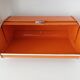 Vintage orange bread hutch