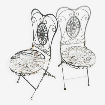 Pair of wrought iron folding chairs