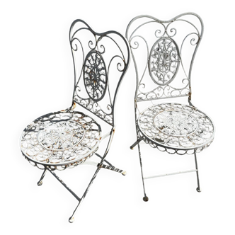 Pair of wrought iron folding chairs