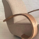 Art deco armchair in walnut and curly fabric