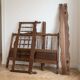 Double bed frame in antique Louis XV style made of solid wood.
