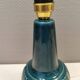 Elegant mid-century ceramic table lamp with an embossed pattern covered in mother-of-pearl glaze.