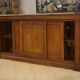 Mahogany workshop furniture with three sliding doors from the 1920s.