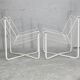 Paire de fauteuils tiges d'acier laqués blanc. Circa 1985
