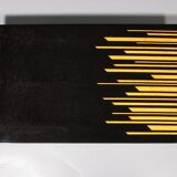 1980s Italian coffee table in black and yellow lacquered wood