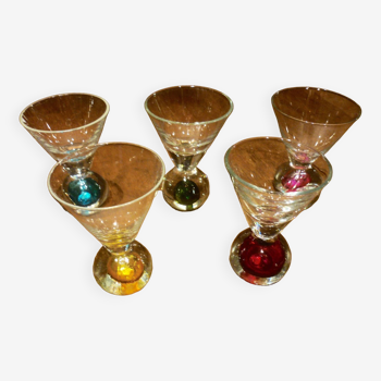 5 small glasses with colored bubble inclusions