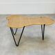 Raoul Guys coffee table, free form, wicker and metal, 1960s.
