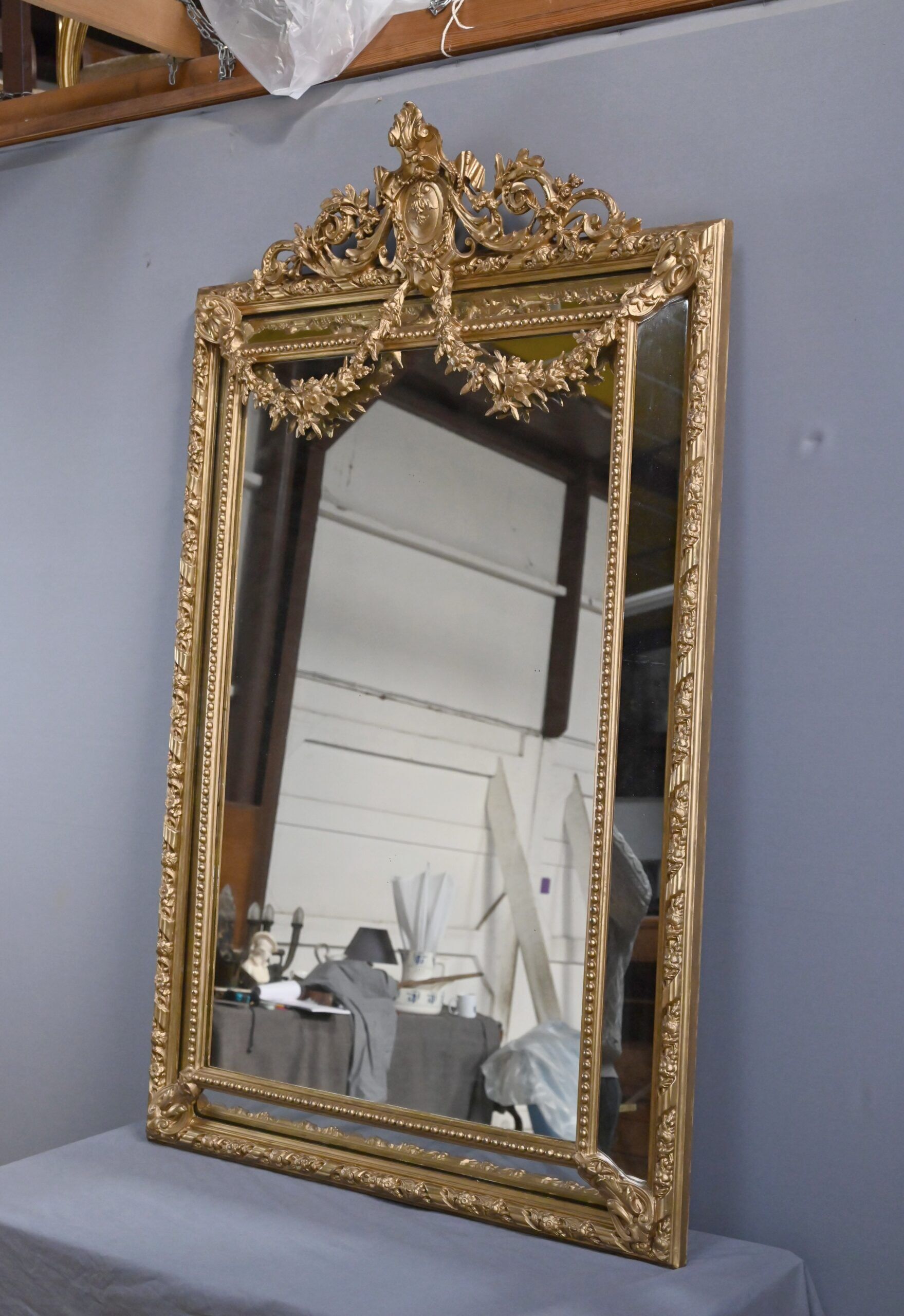 Important mirror with parcloses, Louis XVI style – late 19th century