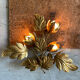 Golden wall lamp foliage