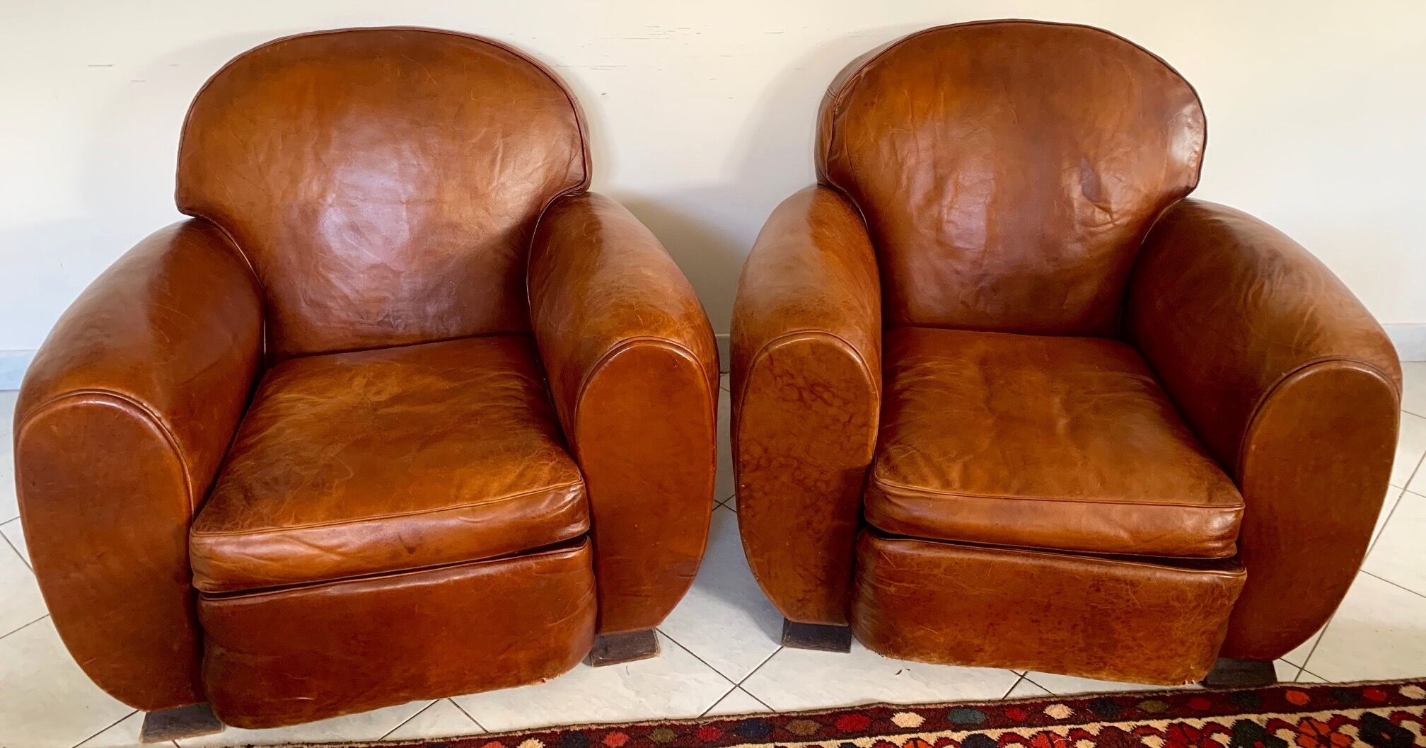 Pair of leather club chairs