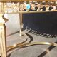 Table basse rode de salon marbre onyx et bronze