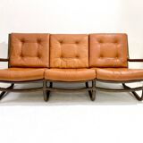 Mid-century modern rattan and cognac leather sofa