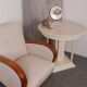 Art Deco armchair from the 1930s in beige fabric and carved wood, Hungarian origin.