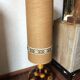 Large vintage ceramic table lamp with rose pattern.