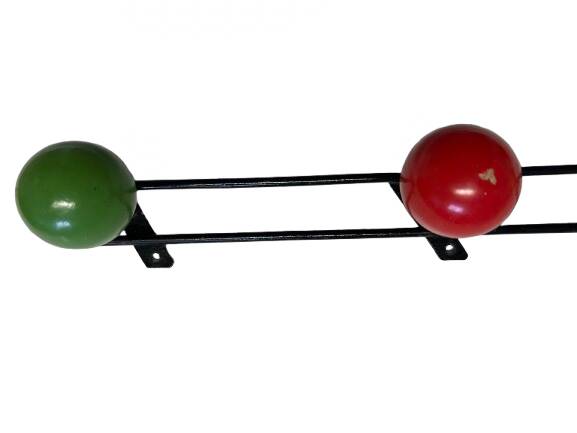 Metal coat rack in the style of Féraud