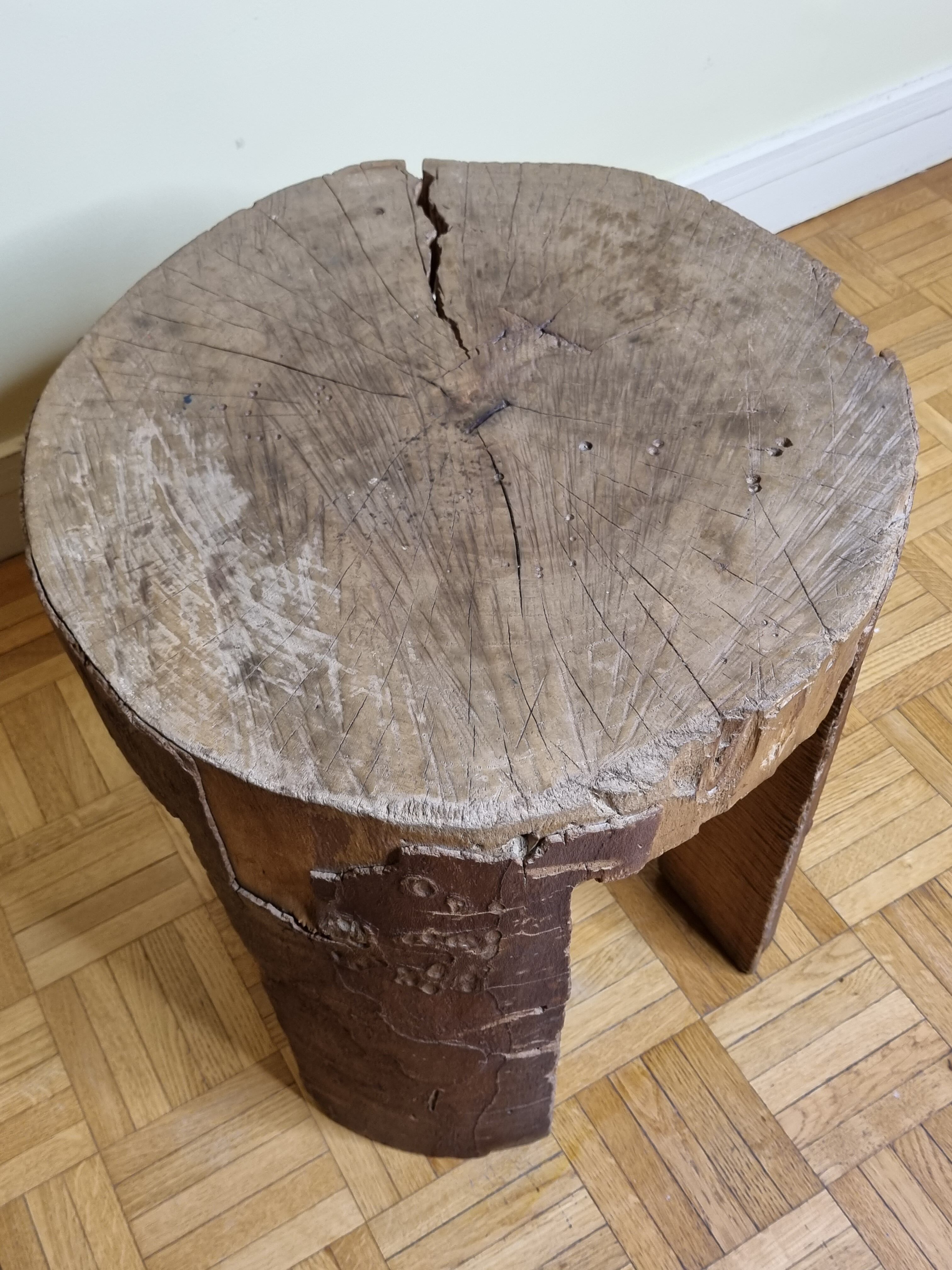 Brutalist solid wood coffee table carved from a room in a plane tree trunk