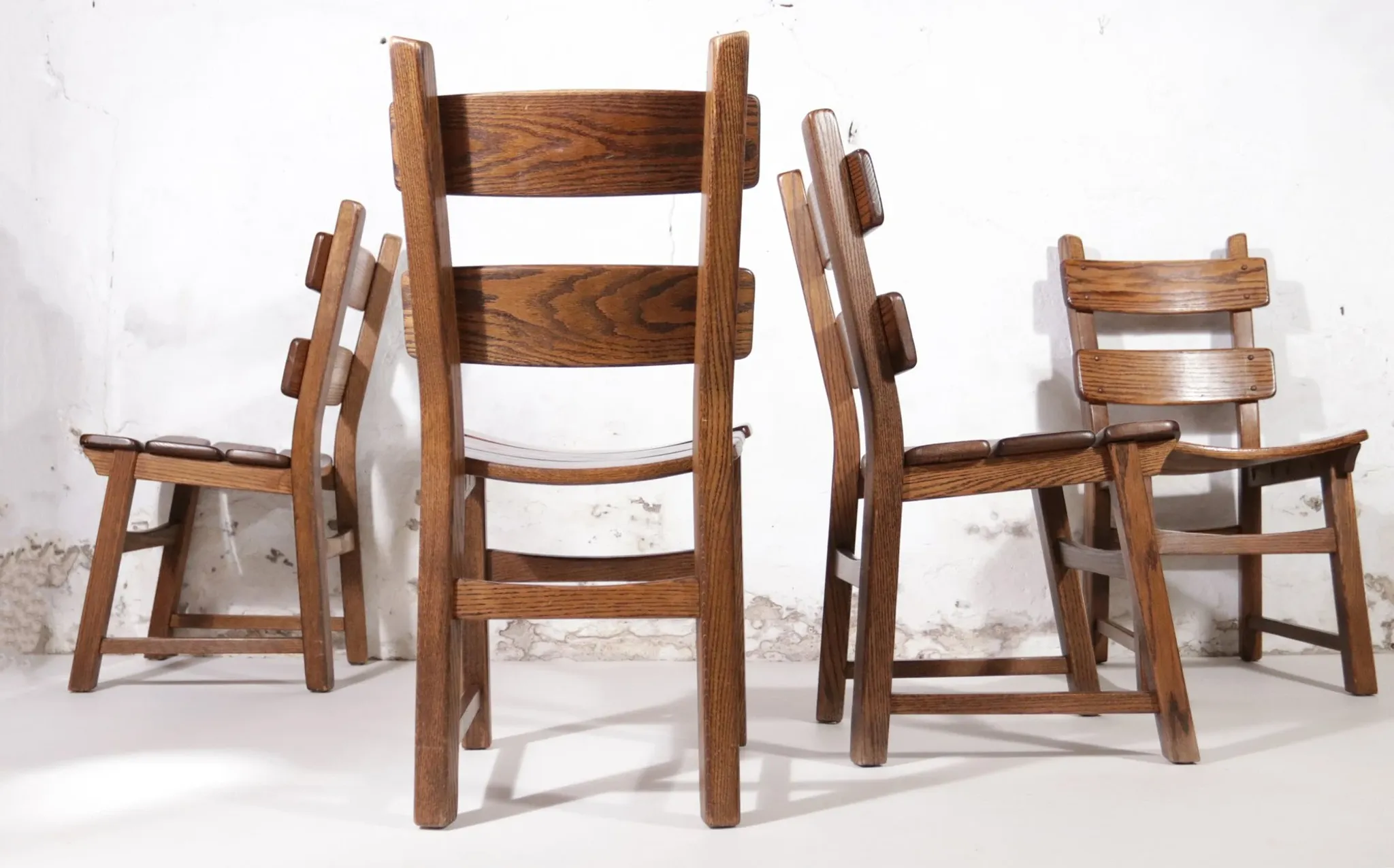 Set of 4 brutalist oak ladderback dining chairs – Netherlands, 1970s