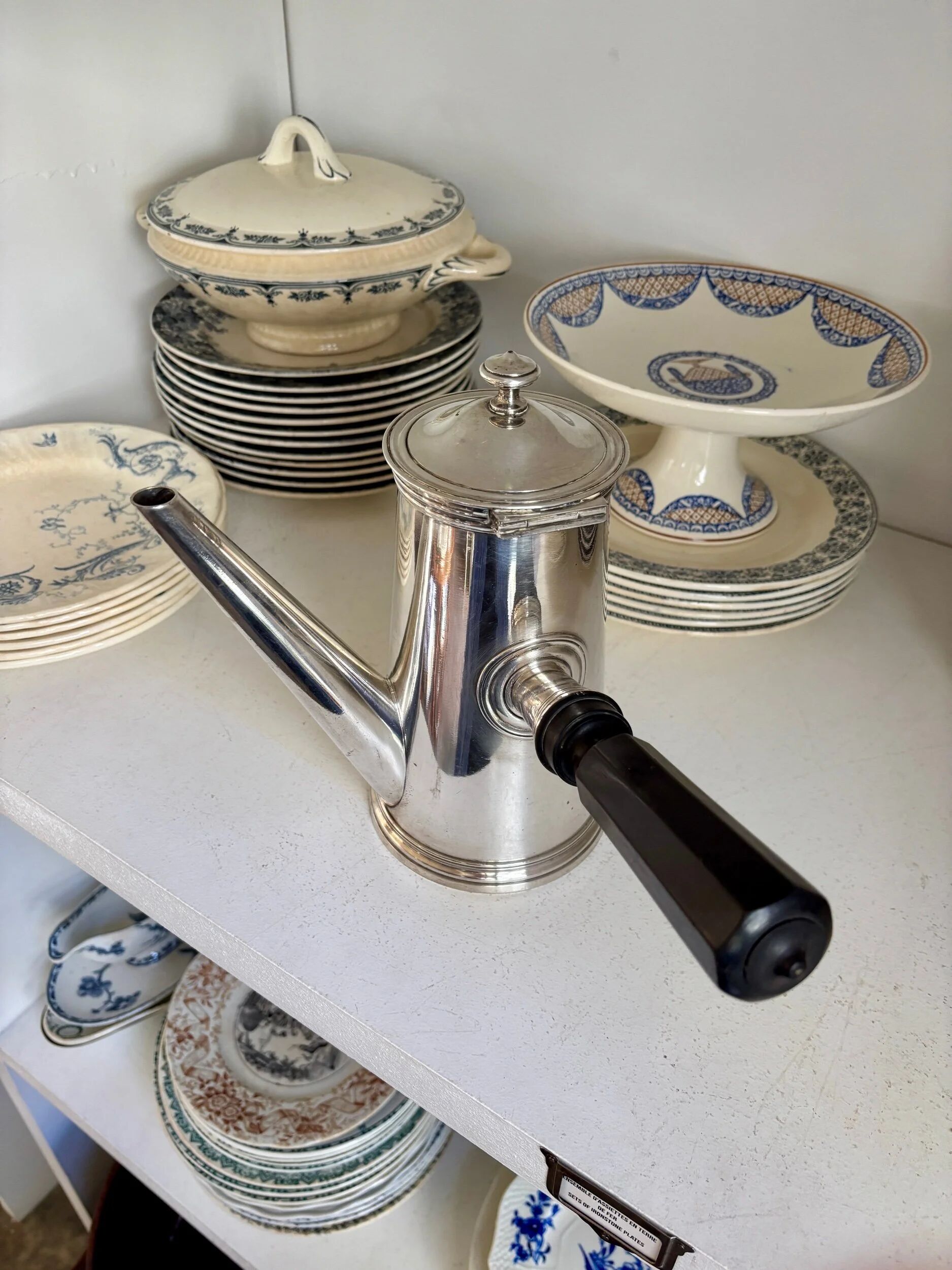 Christofle silver-plated chocolate pot and coffee pot with a blackened wooden handle.