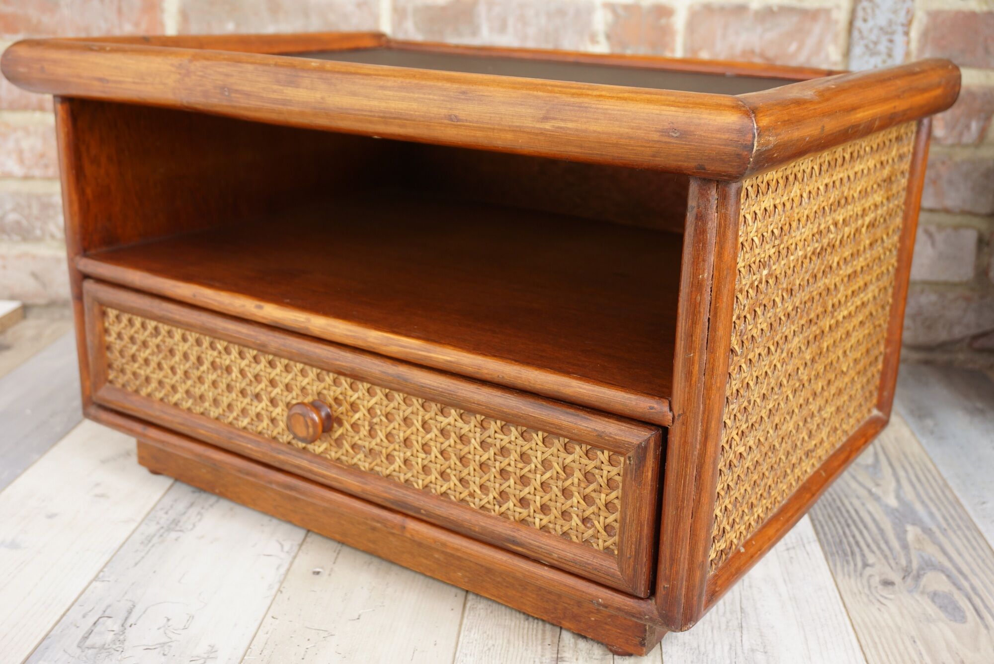 Pair of wooden bedside tables, rattan, canning and faux black leather