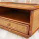 Pair of wooden bedside tables, rattan, canning and faux black leather