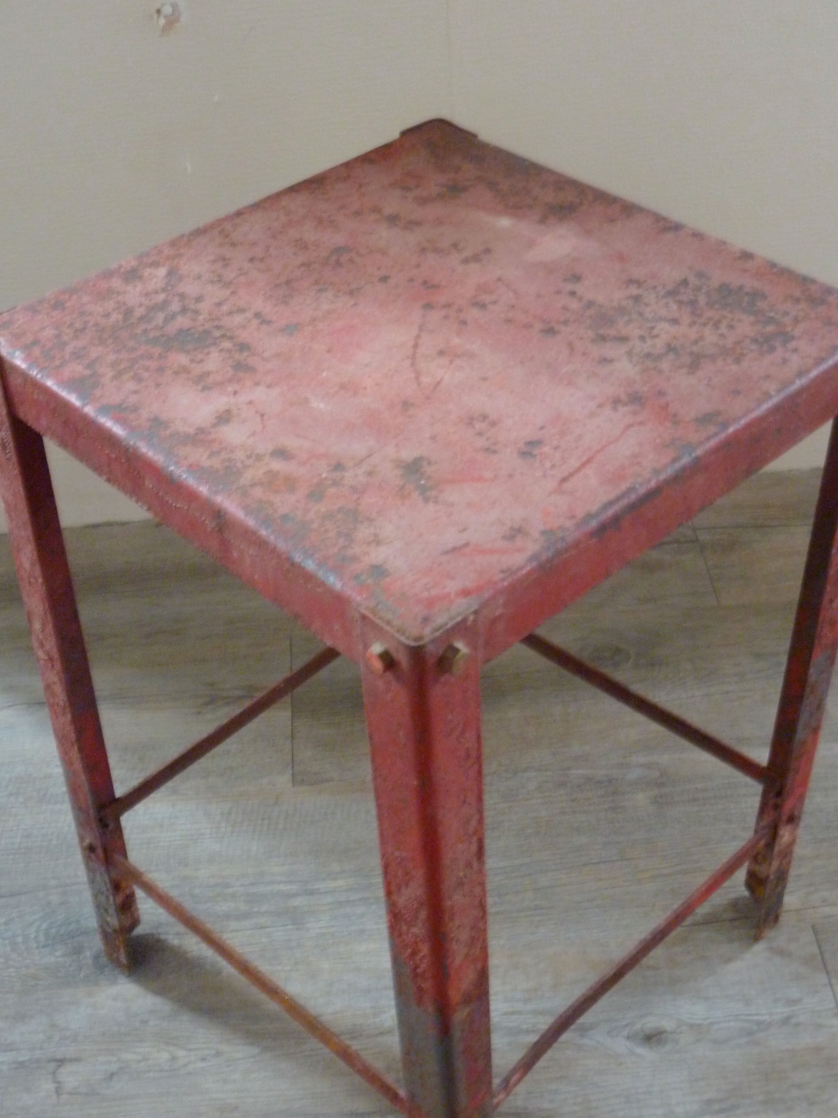 Red metal workshop stool