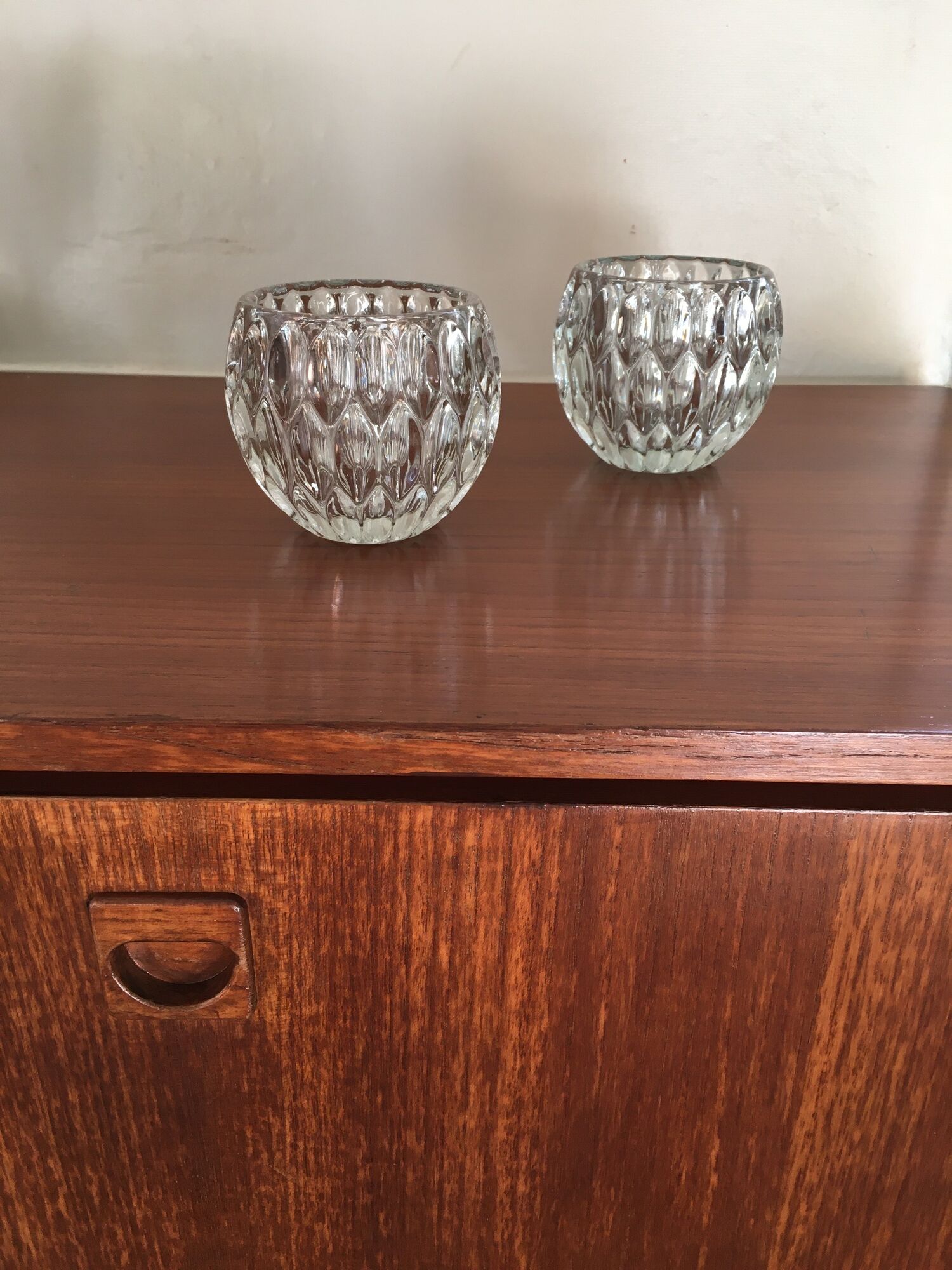 Duo of chiseled glass photophores