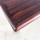 Rosewood dining table with integrated extensions — Denmark, 1960s