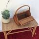 Basket in woven rattan from the 60's