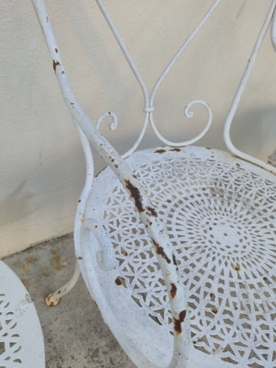 Garden furniture, two armchairs and two wrought iron chairs, period 1