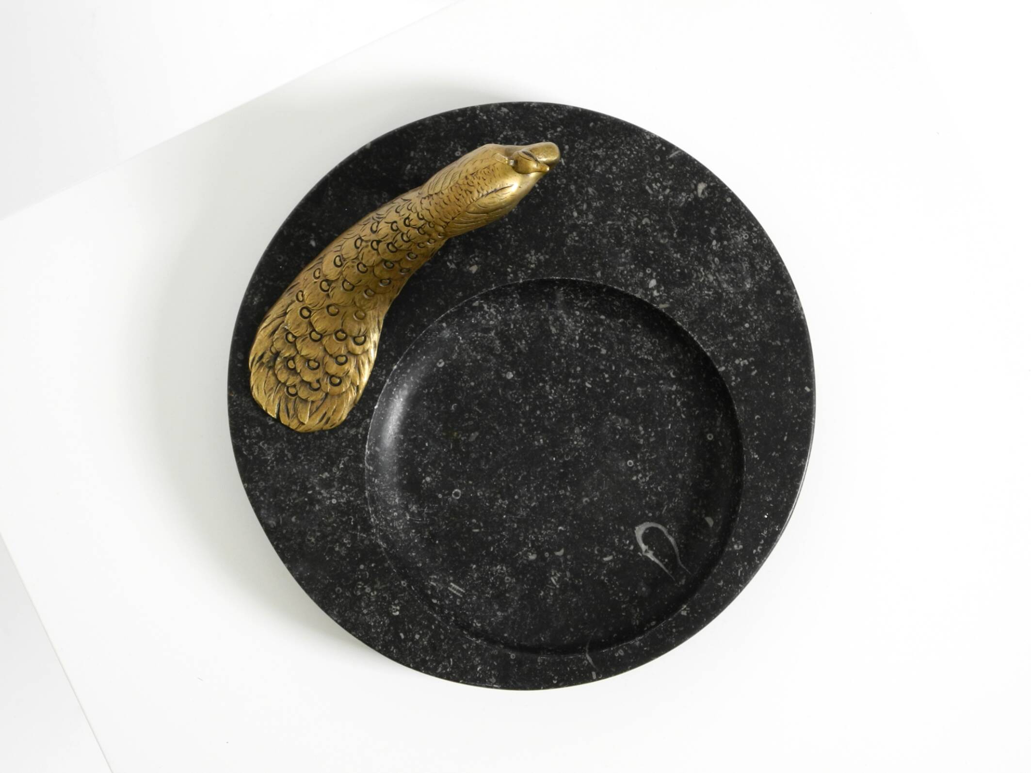 Beautiful, large black granite valet tray featuring a brass peacock, circa