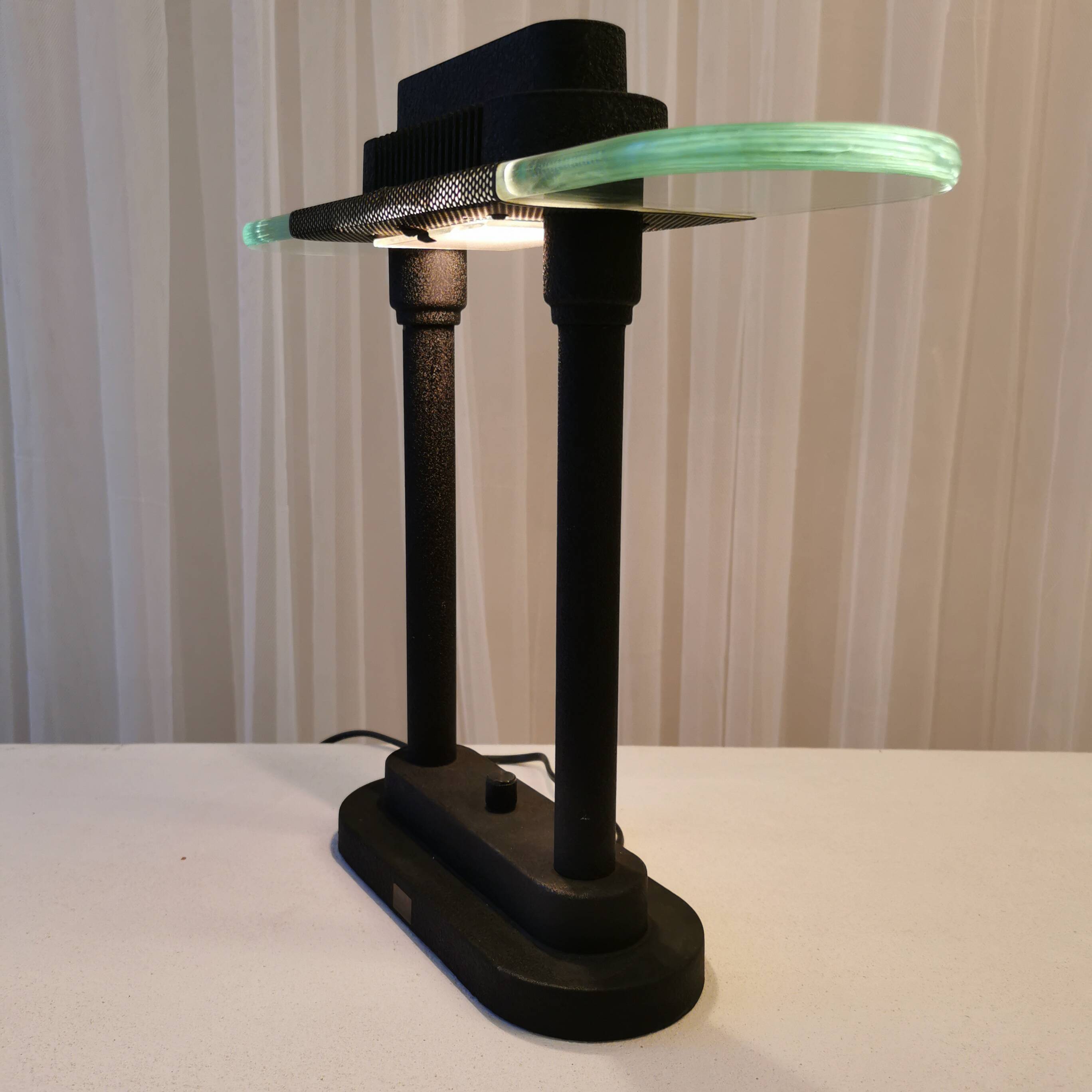 Desk lamp by “Robert Senneman”