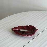 Red ceramic butter dish with knife