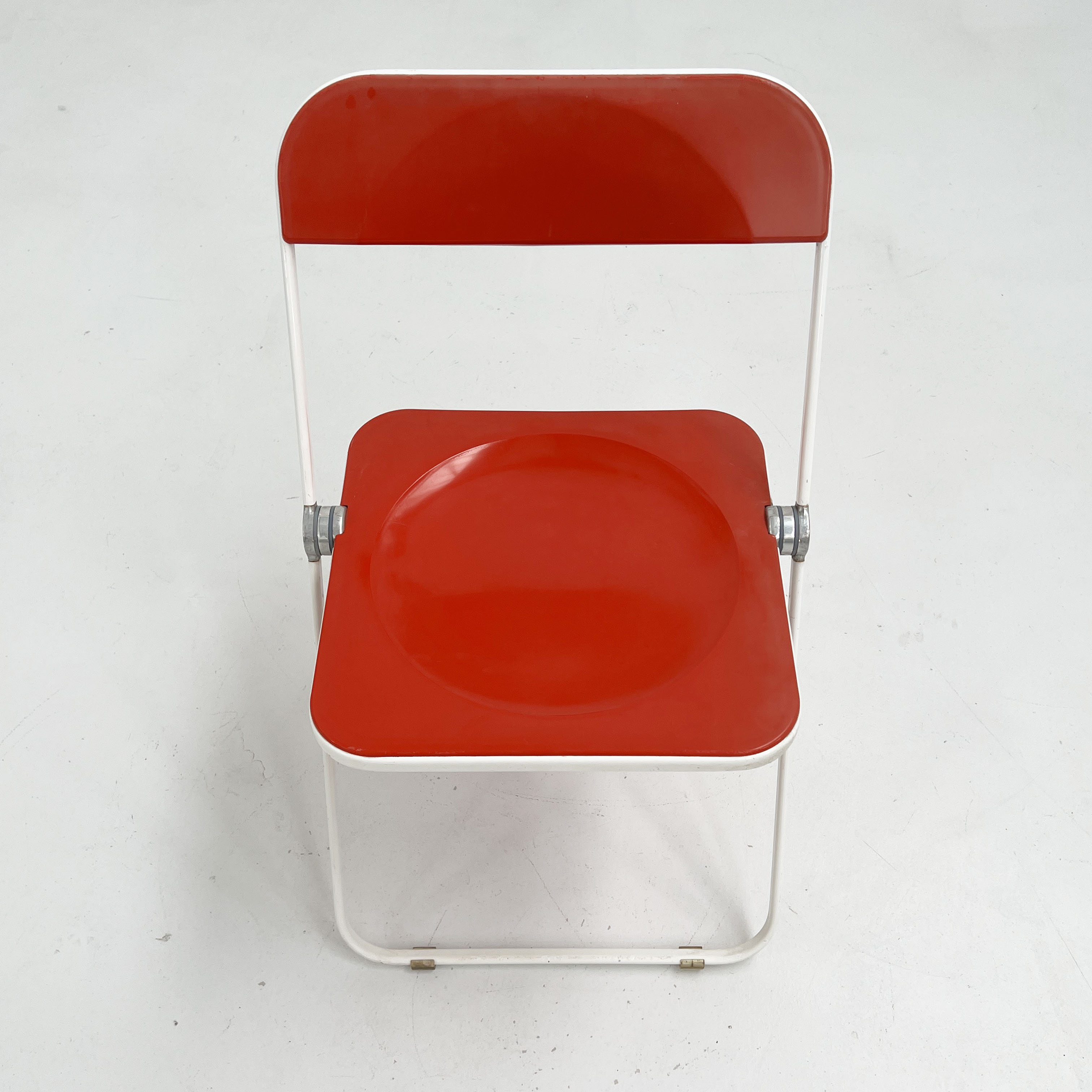 Red and white plia chair by giancarlo piretti for castelli, 1960