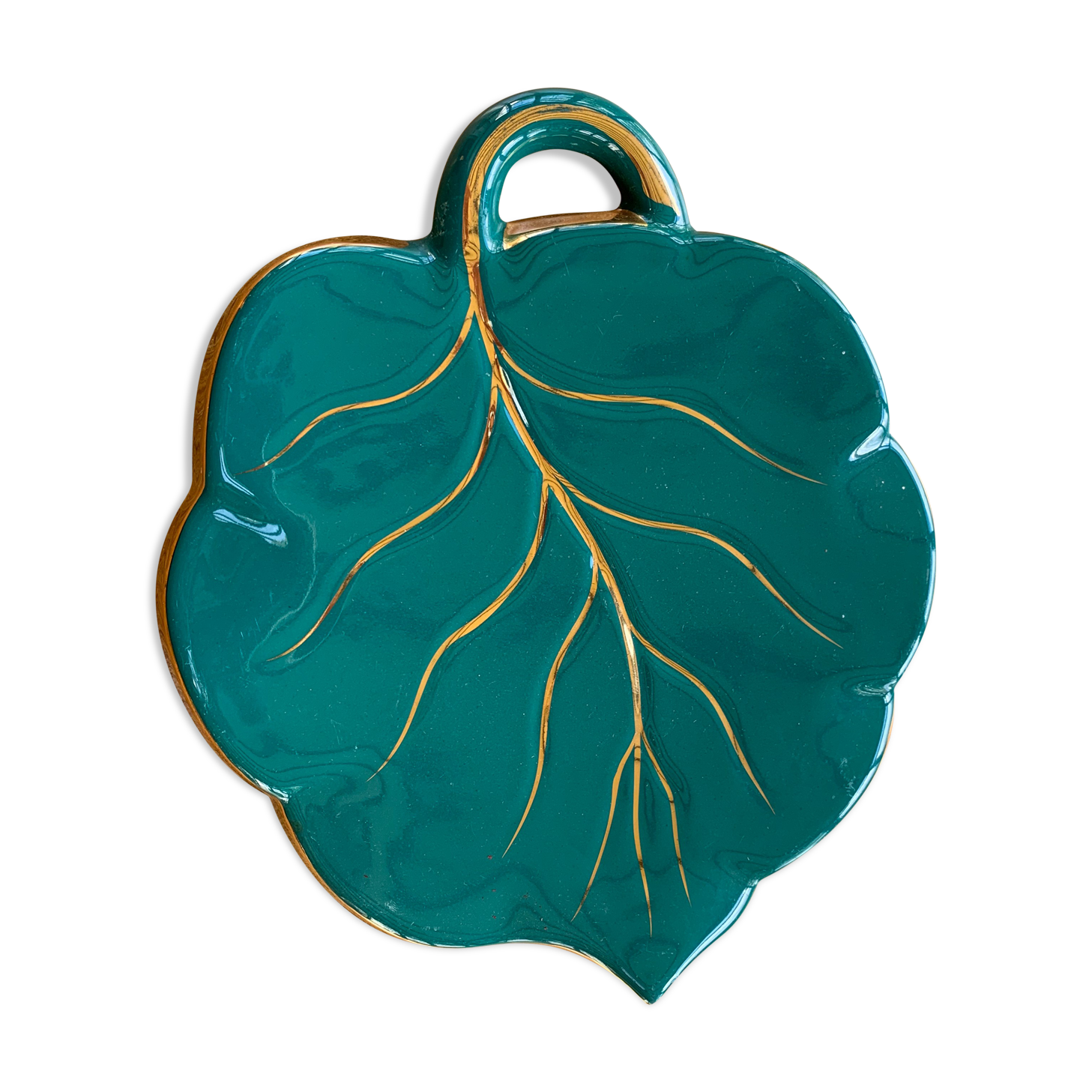 Grained in the shape of vintage dark green enamelled ceramic sheet