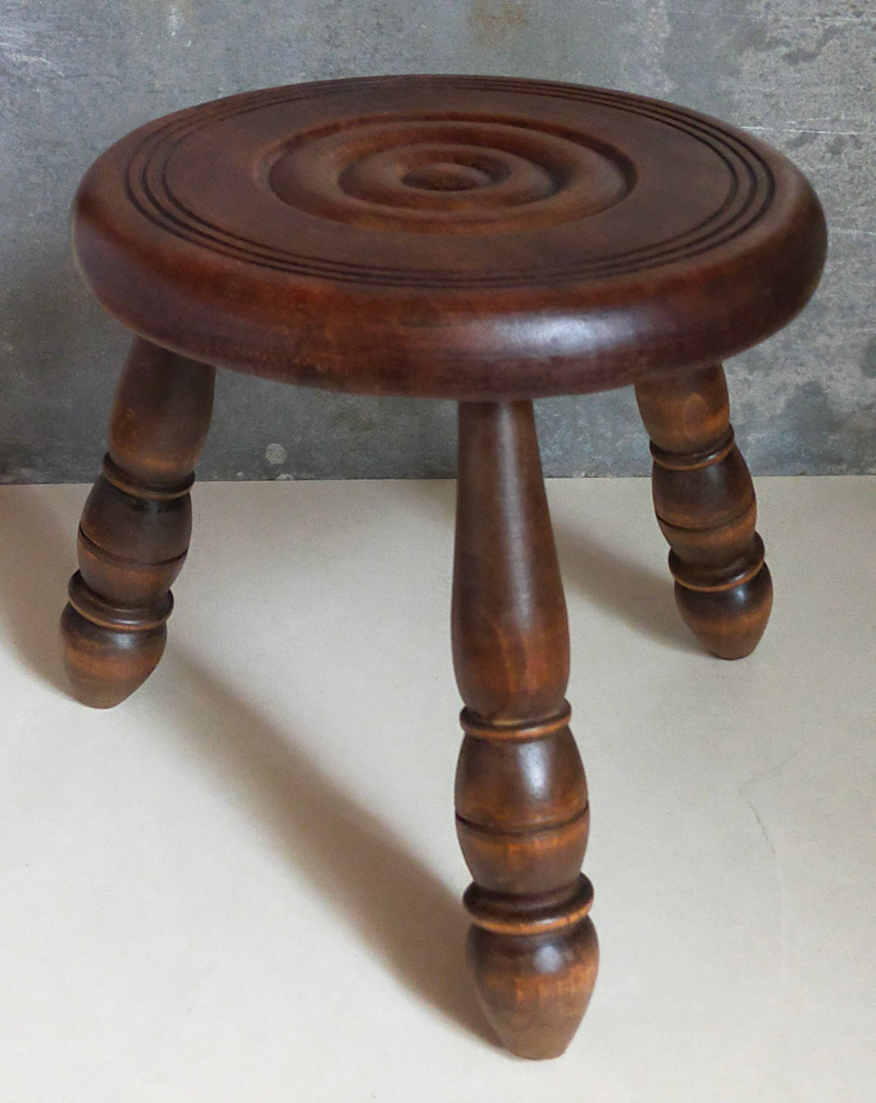 Low tripod stool in vintage turned solid wood